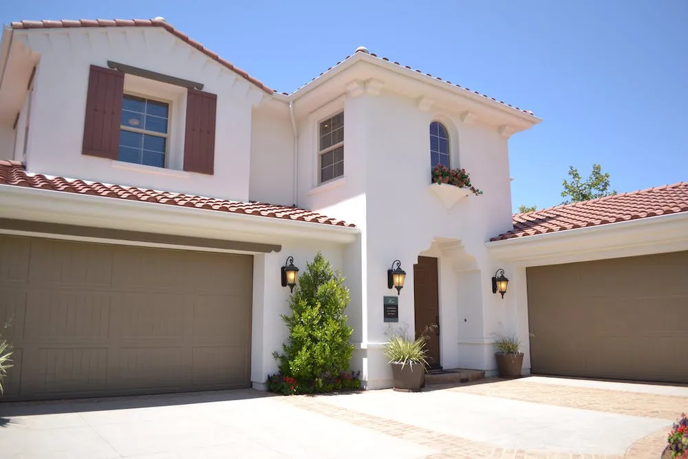 stucco spanish style house two story